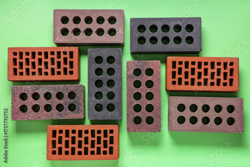 Different bricks on green b...