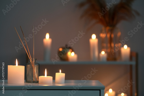 Burning candles and reed di...