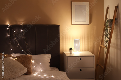 Soft bed, bedside table and...