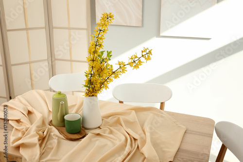 Vase with blooming branches...