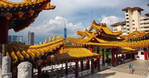 Kuala Lumpur, Malaysia – October 13, 2025: Time-lapse from Thean Hou Temple rooftops as lanterns sway and visitors move below, with Merdeka 118 prominent in the distant skyline