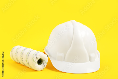 White hardhat with paint ro...
