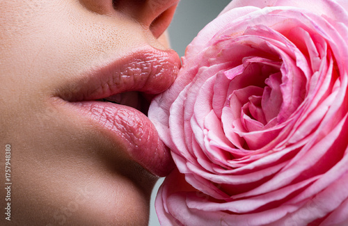 Beautiful woman lips with rose. Sensual womens open mouths. Close up, macro with beautiful mouths.
