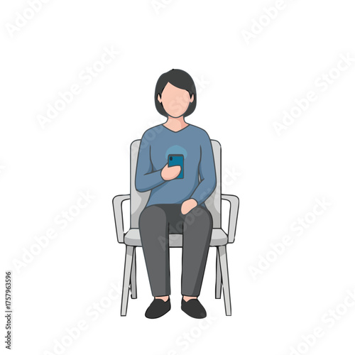 Woman sits in chair in waiting room, looking at her smartphone