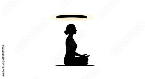 Silhouette of a woman meditating with halo representing spirituality and mindfulness