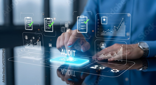 Professional businessman interacts with glowing audit interface for business analysis