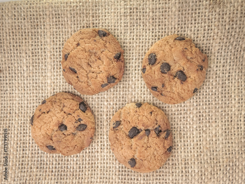 Chocolate Chip Cookies on Burlap Fabric Background