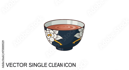 Ceramic Bowl Filled with Brown Liquid and Floral Design.