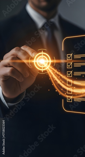 A businessman target checklist digital hologram glowing orange hand suit tie goal strategy planning focus aim success management workflow interface technology innovation concept corporate office
