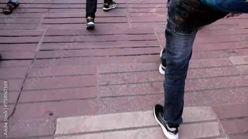 Visitors walk along the gripped walkway inside Agra Fort (Qila Agra), Agra, Uttar Pradesh, India | UNESCO World Heritage Site