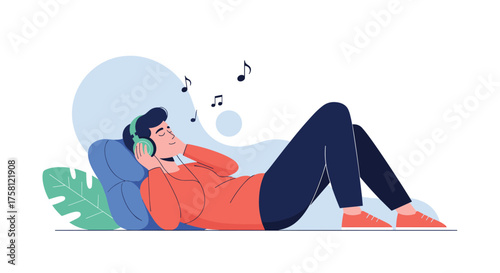 A person is relaxing and listening to music with headphones while lying down on a pillow.