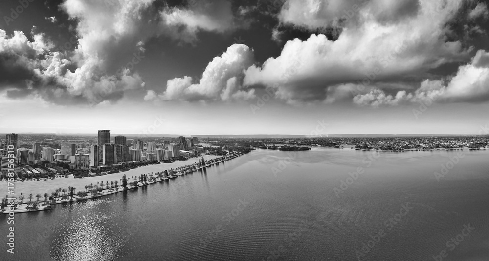 Fototapeta premium Aerial view of Perth skyline from Swan River with clear blue sky and sunny day reflections