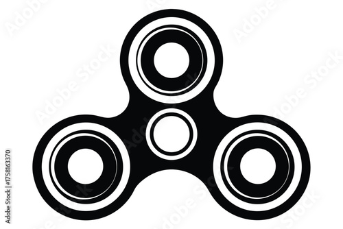 A black fidget spinner exhibits simple rounded edges and concentric circle designs clearly displayed