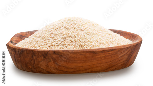 Photos Cassava flour or manioc flour in wooden bowl on white background