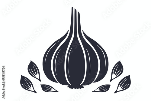 Artistic whole garlic bulb accompanies a halved clove in black and white coloring