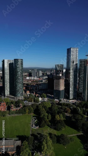 4K: Vertical Aerial Drone shot of Manchester, UK City Centre in Day time. From Hulme Area. Stock Video Clip Footage