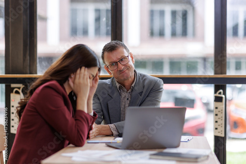 Bild auf Leinwand Employee feeling stressed receiving criticism from boss
