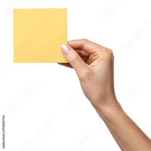Womans hand holding a yellow sticky note isolated on transparent background