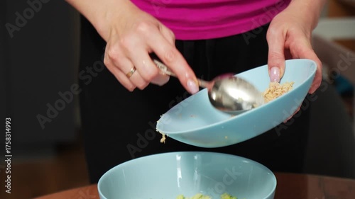 Preparing a simple and tasty meal using canned tuna and pasta on a wooden table
