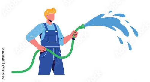 Man in overalls spraying water with hose