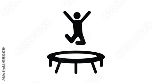 Silhouette of a person jumping on a trampoline