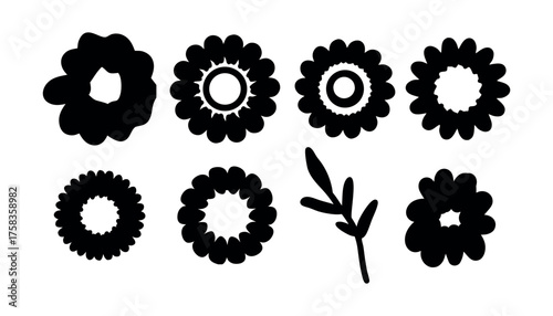 Collection of black silhouette gears and cogs isolated on a white background.