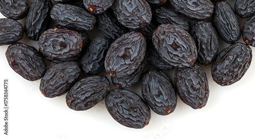 Wallpaper Mural Close up of dried black raisins against a white background for food concepts Torontodigital.ca