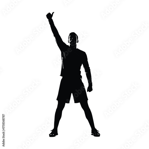 Silhouette of a man with arm raised giving a thumbs up wearing shorts and long sleeved shirt