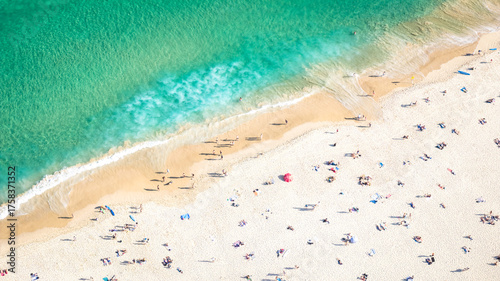 Golden Sands and Sparkling Blue Ocean Under the Summer Sun