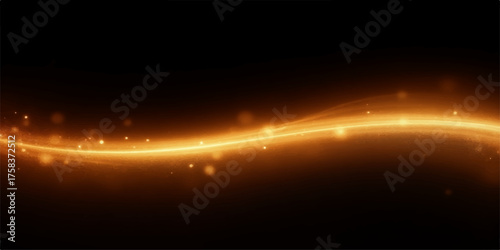 Abstract glowing golden wave with sparkling particles on a dark background