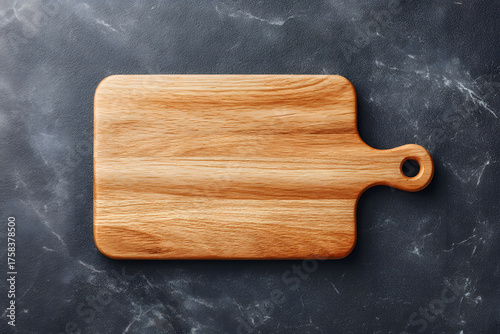 A close-up view of a wooden cutting board, and  ready for a food mockup.