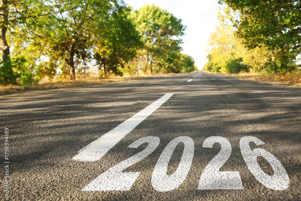 Obraz premium New 2026 Year. Numbers written on asphalt road
