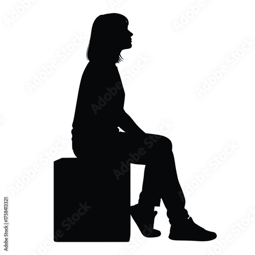 Silhouette of a woman sitting on a box looking to the right against a white background