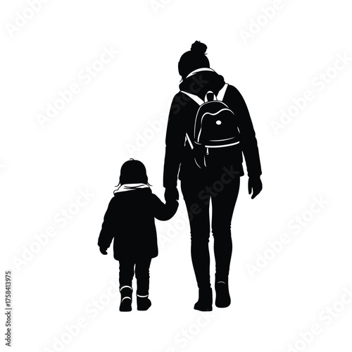 Silhouette of a mother with backpack holding hands with child walking away from viewer