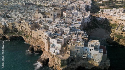 Aerial view of Polignano a Mare, panorama of the waterfront and the buildings of the old town, Puglia, Italy