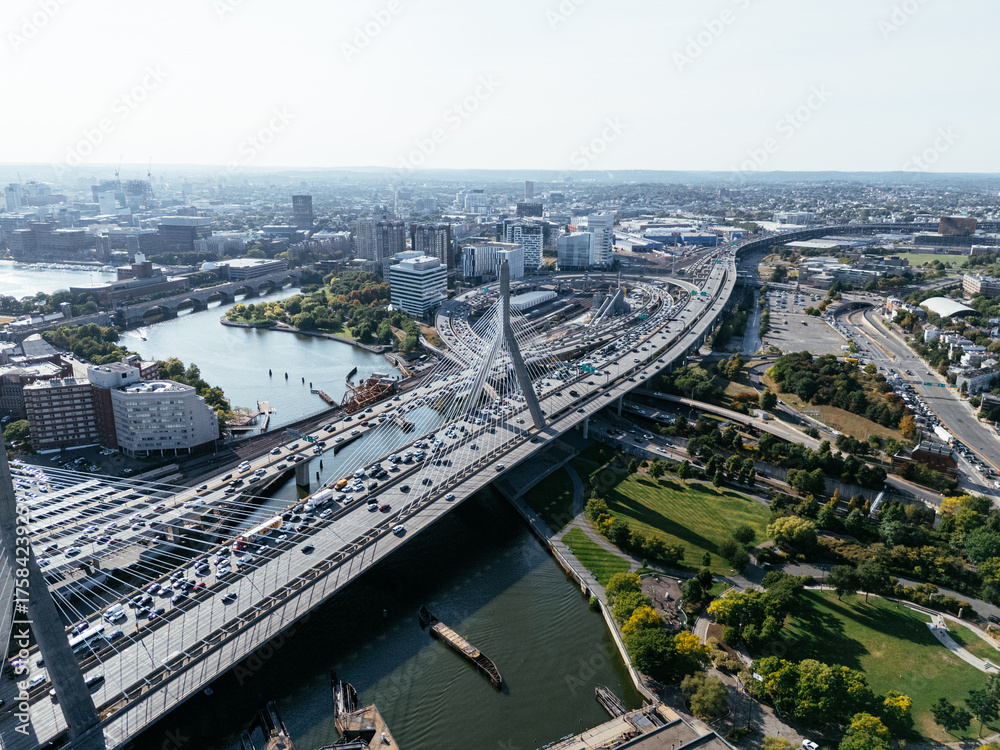 Obraz premium Aerial view of Boston city, bridges and river with skyline in sunlight. g.