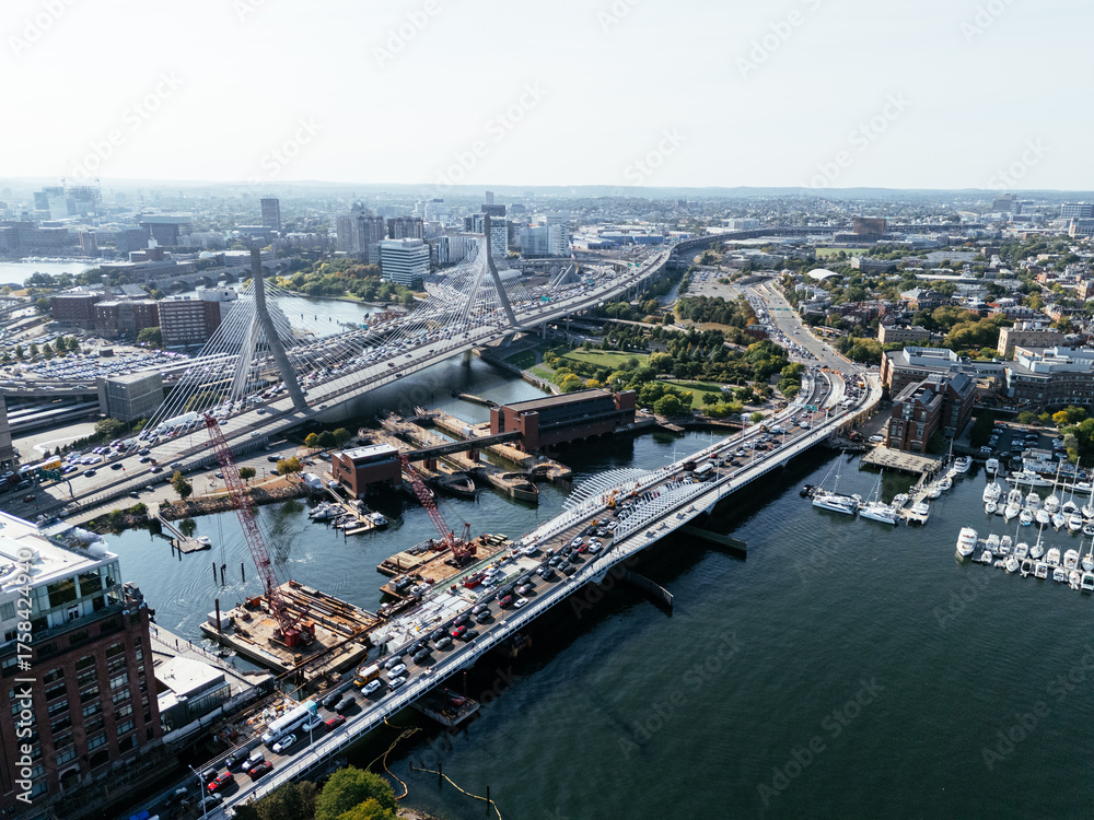 Obraz premium Aerial view of Boston city, bridges and river with skyline in sunlight. g.