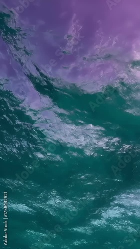 Vertical breathtaking underwater view of crashing waves