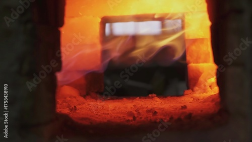 Konstfotografi Hot metal glowing inside brick furnace. Stock clip