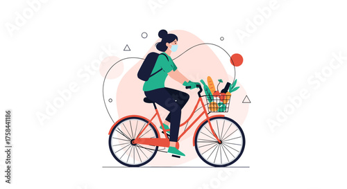 A person on a bicycle with groceries in a basket is cycling down the street.