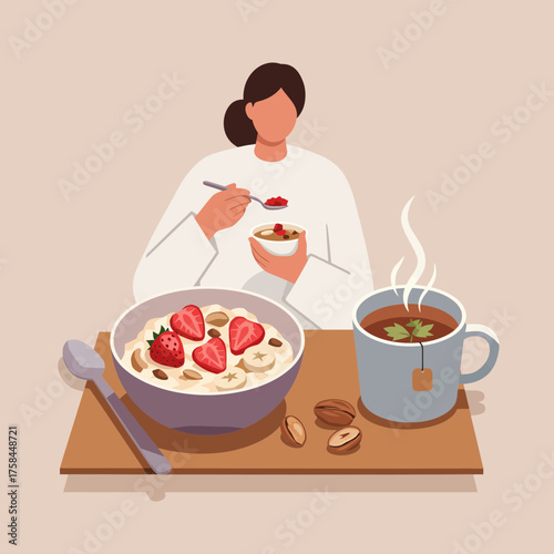 Woman enjoying a healthy breakfast of oatmeal, fruit, and tea on a wooden tray.