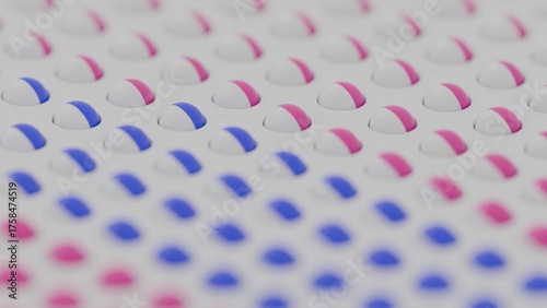 Rotating pink and blue pills on white background. Design