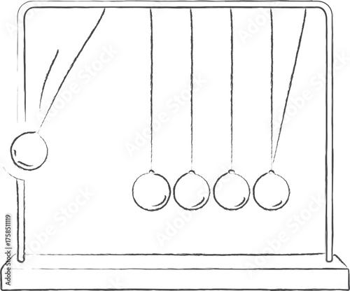 Newtons cradle on desk with swinging spheres