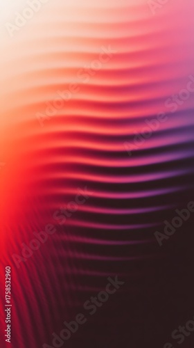 Gradient waves of red, pink, and purple create an abstract background.