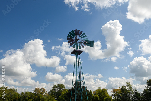Canvas Print Old metal windmill under sky