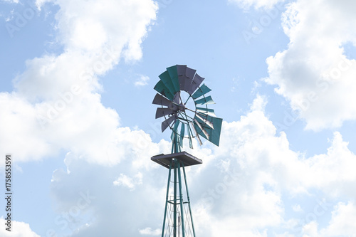 Canvas Print Old metal windmill under sky