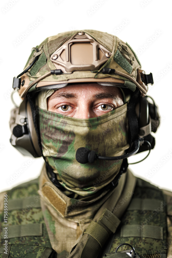 Fototapeta premium Close-up of a Soldier in Tactical Gear on a White Background