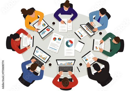 Overhead view of diverse professionals collaborating around a table, reviewing documents and working on laptops in a business meeting.