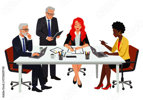 Four business professionals, three women and one man, are seated around a table during a meeting, working on laptops and taking notes.