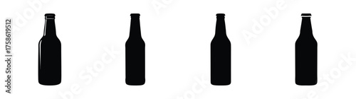 Fourdarkbeerbottlesarrangedinarowreadyforarefreshingbeverageoccasion